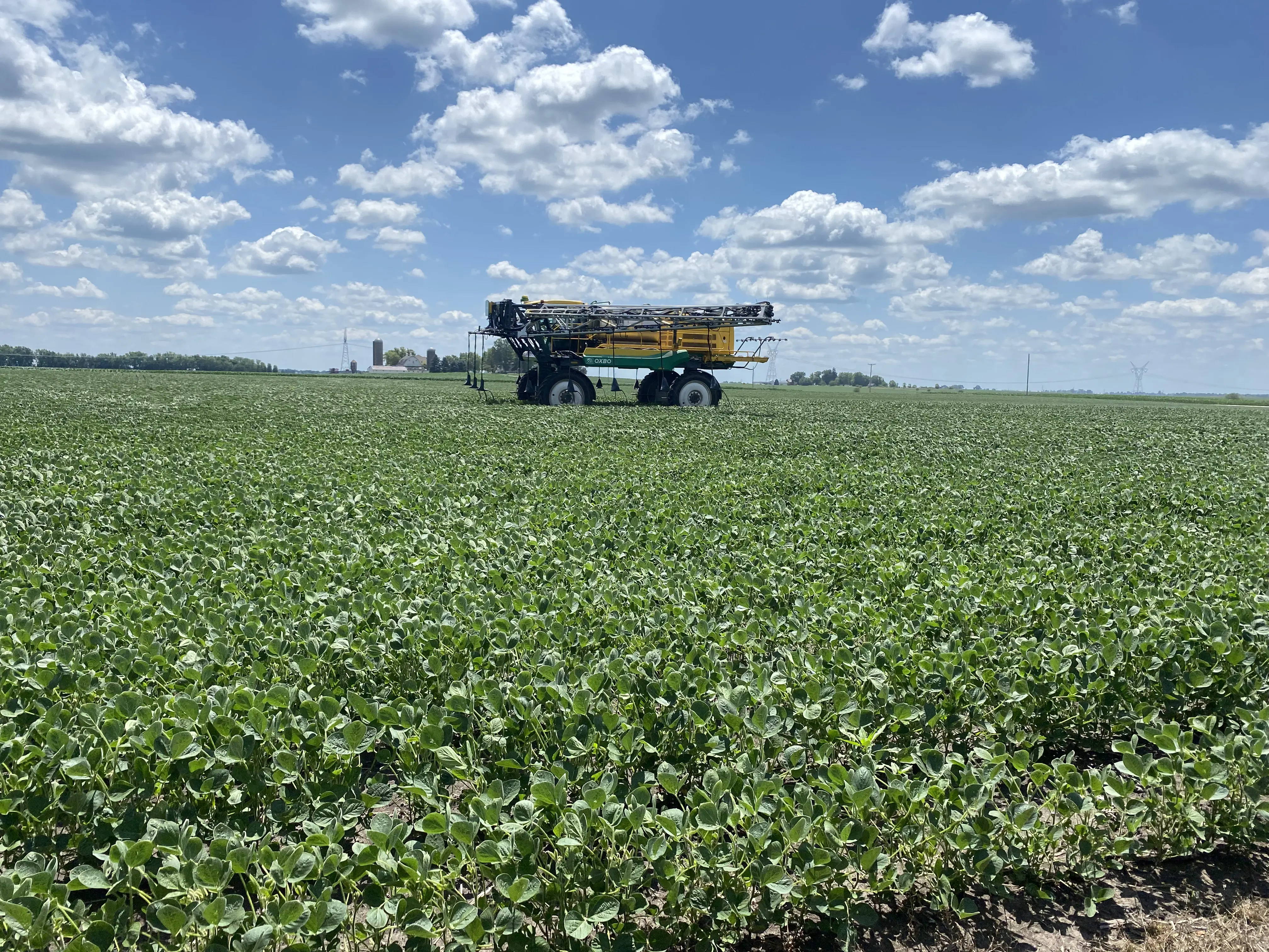 Wilkening sprayer working a field